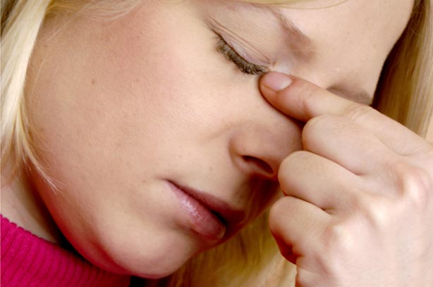 Nasal Polyps woman sinus pain headache