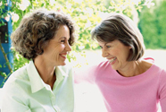 Two women smiling