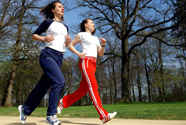 Two women jogging outdoors Two women jogging outdoors