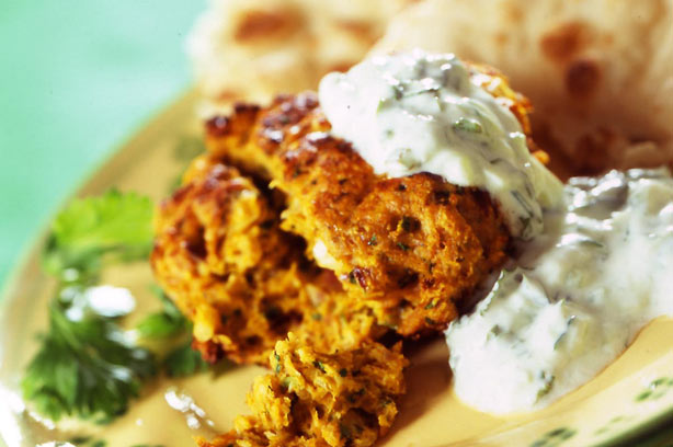 Tikka kebab with naan bread and raita