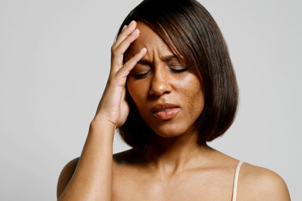 Adult Sickle cell headache woman