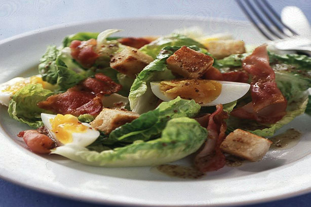 Warm egg and bacon salad