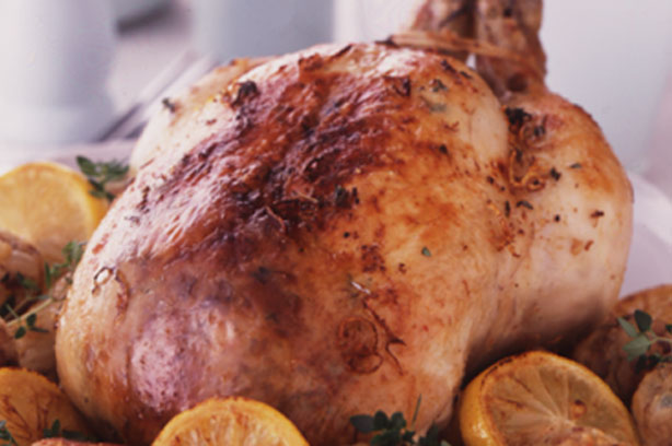 Roast chicken with lemon and thyme butter glaze