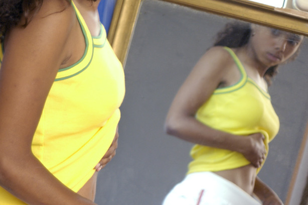 Adult Body dysmorphic disorder woman mirror eating disorder anorexia bulimia