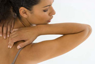A woman suffering from back pain