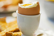 A soft-boiled egg with soldiers