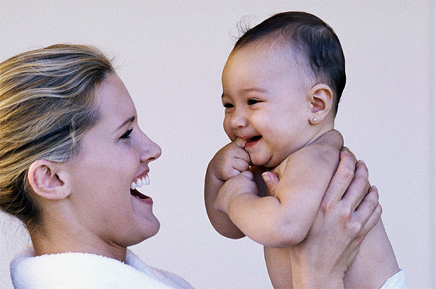 Development milestones mother baby cuddle Development milestones mother baby cuddle