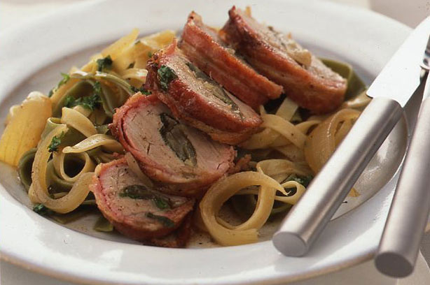 Bacon wrapped pork with sage and onion