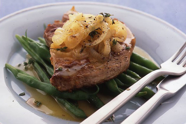Pork steak with onions and cider sauce