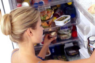 Avoid food poisoning woman fridge
