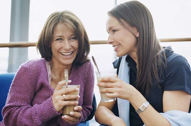 Two women drinking in a cafe