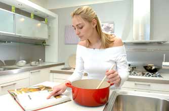 James Tanner tips saucepan woman cooking kitchen James Tanner tips saucepan woman cooking kitchen