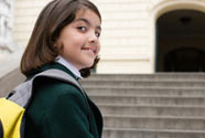 A young girl going to school