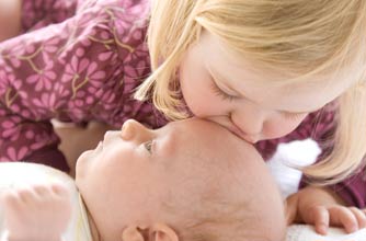Toddler and new baby bonding