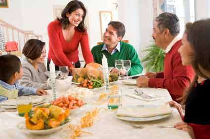 A family enjoying a traditional dinner A family enjoying a traditional dinner