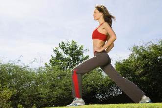 Woman stretching outdoors
