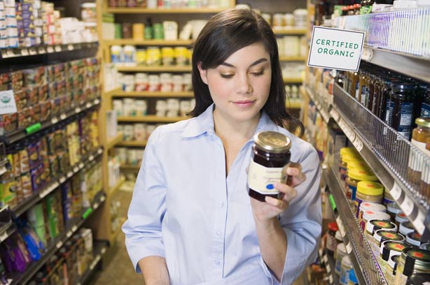 Woman-shopping-looking-at-food-label