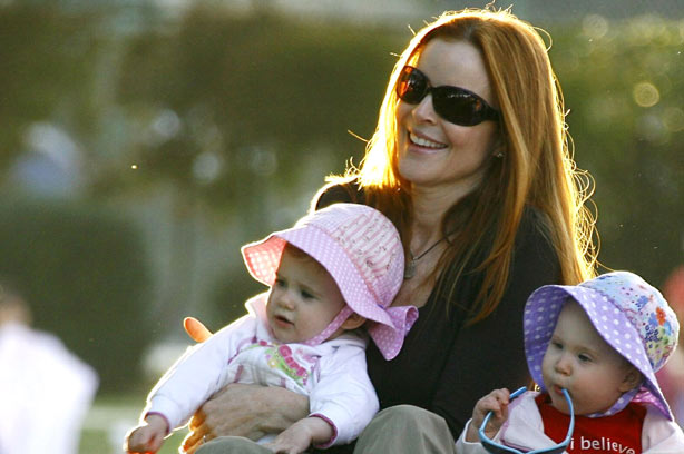Marcia Cross from Desperate Housewives sits in the park with her
