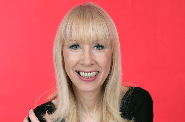 Judi James, sex and relationships expert, on a pink background