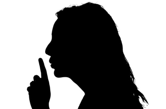 Silhouette of a woman lifting finger to her lips