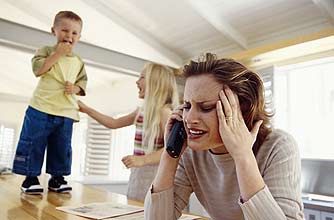 A stressed mum struggling to cope with her kids