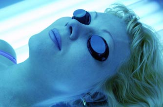 Woman on a sun bed