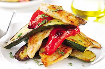 Chicken breasts roasted with peppers and courgettes