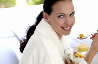 Woman eating breakfast