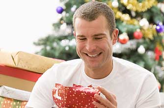 Man-opening-christmas-present