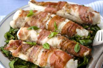 Prosciutto-wrapped monkfish with warm lentil salad Prosciutto-wrapped monkfish with warm lentil salad