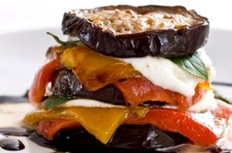Roasted aubergine, pepper and scarmozza stack pesto and balsamic syrup