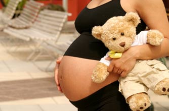 Pregnant woman with teddy Pregnant woman with teddy