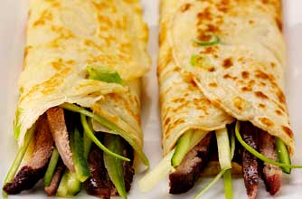 Spring onion pancakes with shredded duck