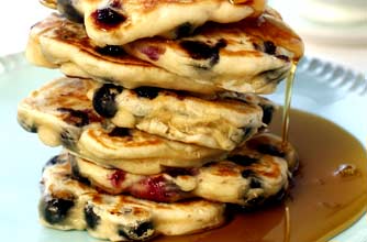 Blueberry pancakes with maple syrup