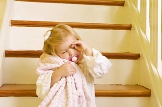 child sleepwalking on the stairs