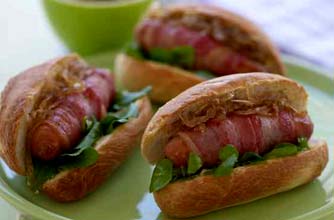 Sausage and bacon mustard wraps with caramelised onions