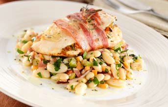 Pancetta wrapped chicken with cannellini bean salad