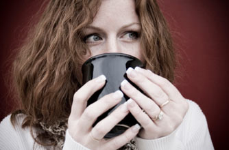 Woman with cup of tea Woman with cup of tea