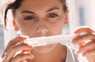 Woman with a pregnancy test