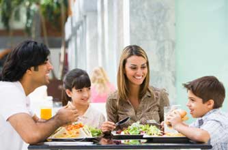 Family eating in a restaurant Family eating in a restaurant