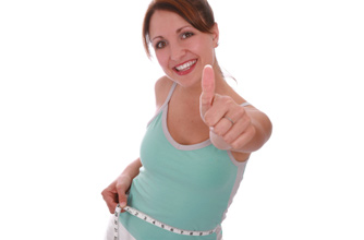 Woman with tape measure and thumbs up
