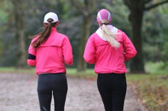 Two women jogging together Two women jogging together