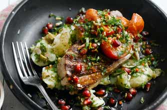 Lamb steaks with pomegranate gremolata and roast tomatoes