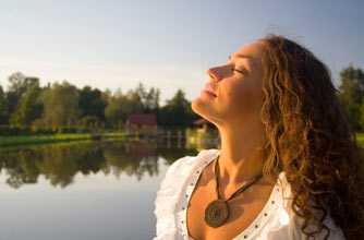a woman breathing fresh air a woman breathing fresh air