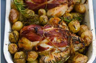 Roast baby chickens with new potatoes