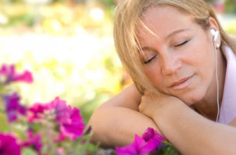 woman listening to music, me time treats woman listening to music, me time treats