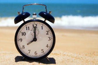 Clock on a beach