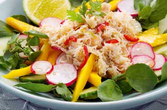 Essentials magazine, spicy crab and mango salad