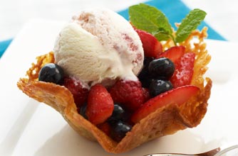 Summer berry salad in brandy snap baskets recipe