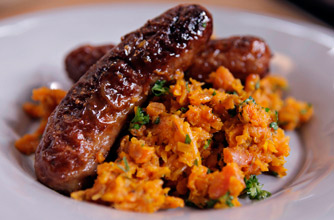 Nigel Slater's mustard & lemon sausages with carrot mash